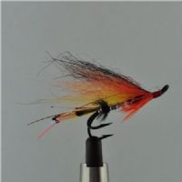 PAR0123 - Black/Orange/Yellow Sølv Body - Str.4<br>Sierra mønster her bundet på AHREX VS430 med Artic fox winge