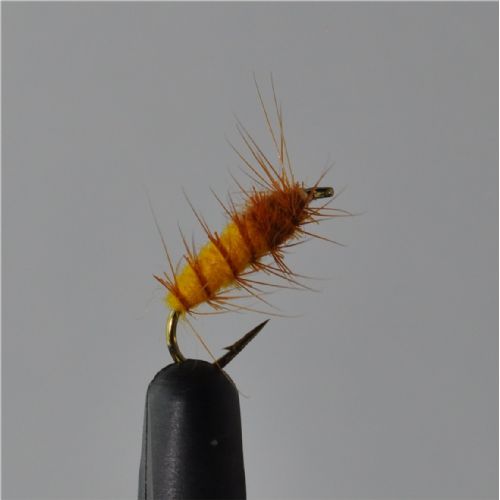 FLY1212 - Superpuppa Yellow/Olive – Str.12<br>Superpupa, mest brugte flue ved mange Nordiske elve<BR>
Str.6 og 8 har jeg selv fiske Silver Salmon med i Michigan med stor held<BR>
prøv den i en Norsk elv, så skal du se løjer