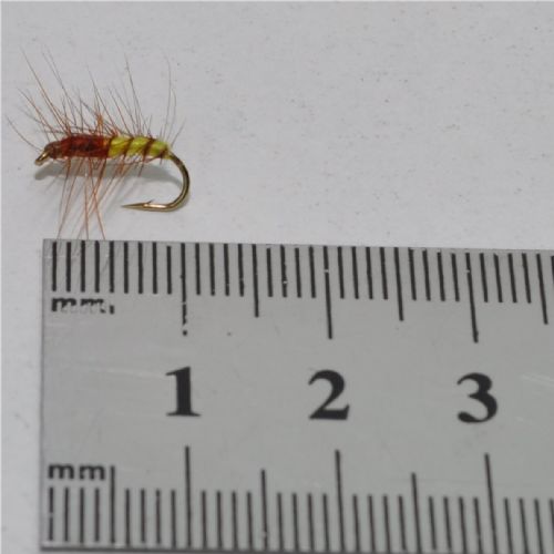 FLY1213 - Superpuppa Yellow/Olive – Str.14<br>Superpupa, mest brugte flue ved mange Nordiske elve<BR>
Str.6 og 8 har jeg selv fiske Silver Salmon med i Michigan med stor held<BR>
prøv den i en Norsk elv, så skal du se løjer